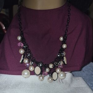 Elegant Black and Pearl Necklace with Pink Highlights